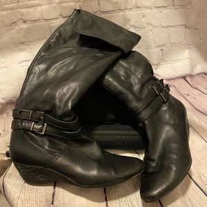 Black over the knee boots with wedge heel